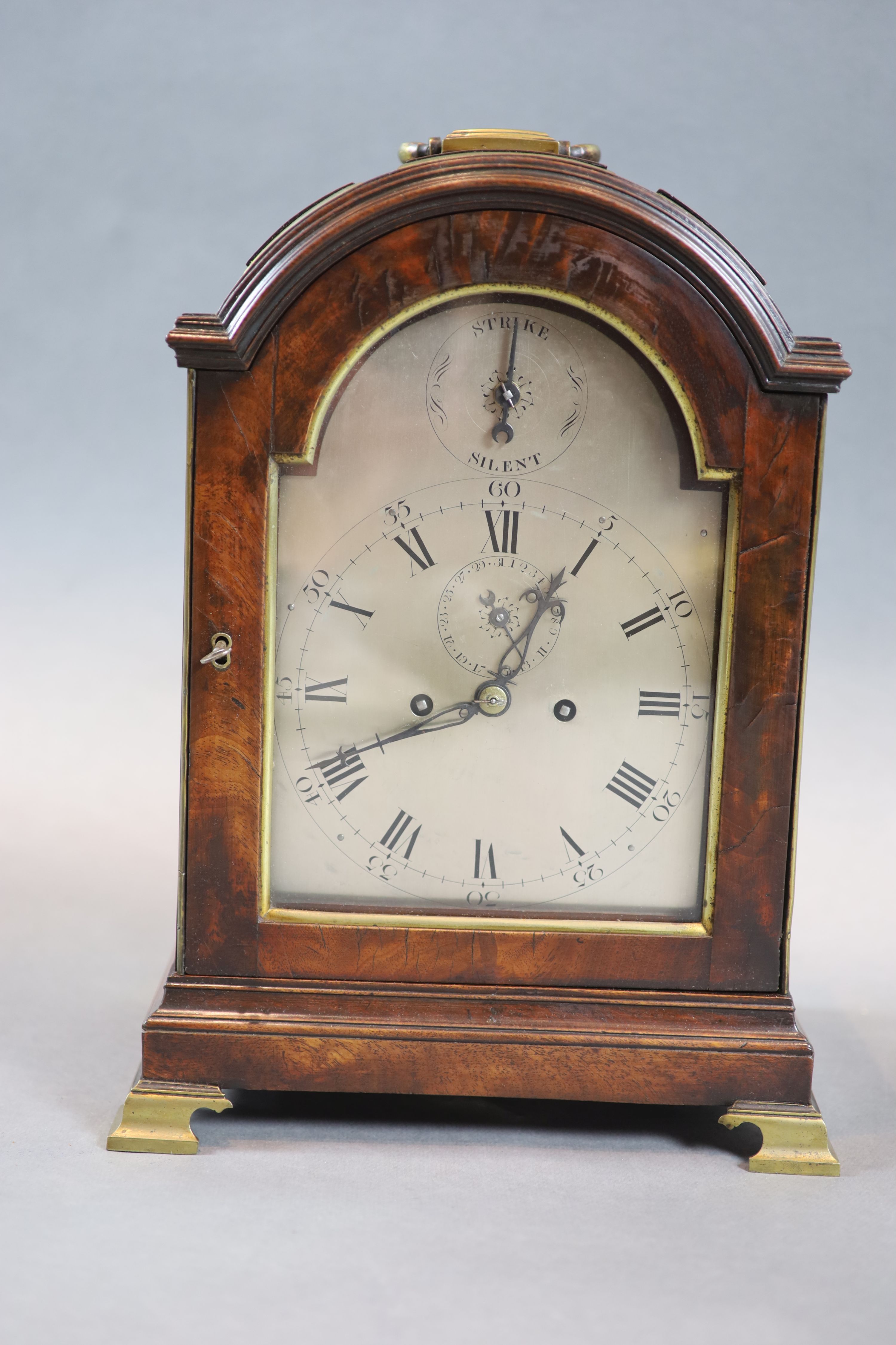 A George III eight day mahogany and brass mounted bracket clock, 39cm high.